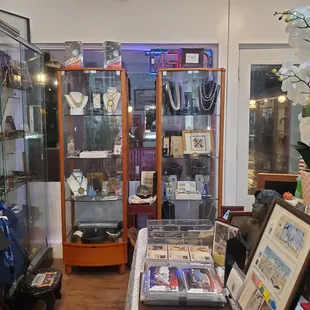 Sport cards, postcards, and albums full of collectible items.