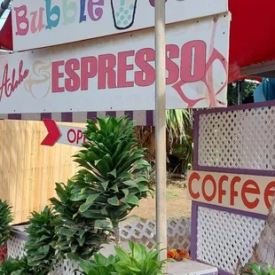 a sign for a coffee shop