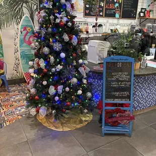 front entrance with specials board and Christmas tree