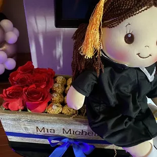 a graduation doll