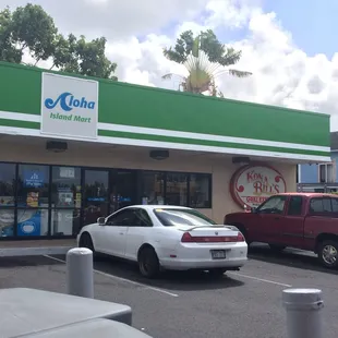 a car parked in front of a gas station