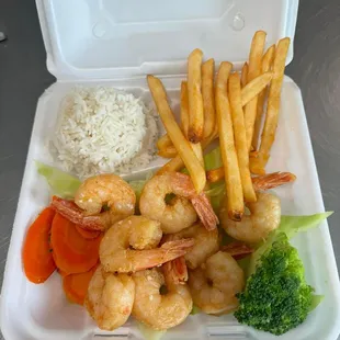 Garlic Butter Shrimp, Steam Veggies, Steam Rice and French Fries.
