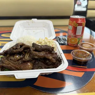 Hawaiian BBQ plate with a drink.