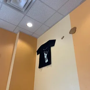 dirty shirt hanging up