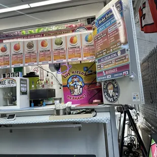 a food truck with a menu on it