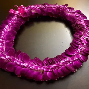 Here's the orchid lei out of it's box