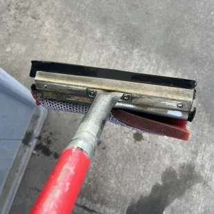 Contestant #2. She might have a droopy sponge, but she shines when it's squeegee time.