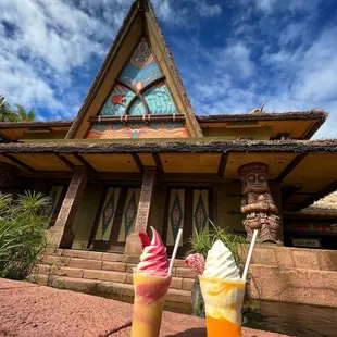 two drinks in front of a building