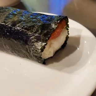 a sushi roll on a plate