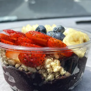 a bowl of fruit and oatmeal