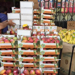 a display of apples and bananas