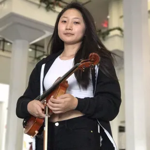Nicole she study with me since she is in 1st grade now she is a senior.Concert master of MidPac. Members of the youth symphony.