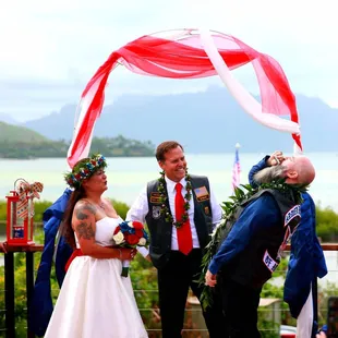 Officiant for this May Day Leis Day wedding.  The couple wanted to get married in biker cuts, so I wore mine too.  Sip of courage first