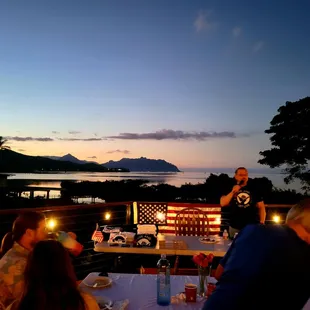 Marc speaking to the chapter as the sun sets