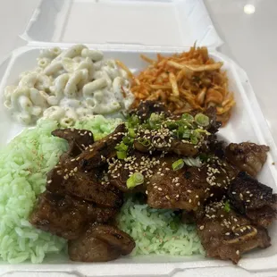 Kalbi with kimchi and macaroni salad.