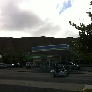 a gas station and a motorcycle