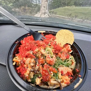 3 topping poke bowl  Brown rice  Seaweed salad  Crab meat Marinated salmon Crawfish  marinated albacore (? I think)