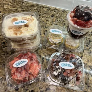 Banana pudding, brownie cheesecake cup, strawberry shortcake bites, Oreo bites, cupcakes