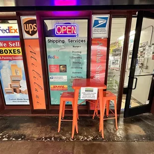 Table and stools out front. Very handy!