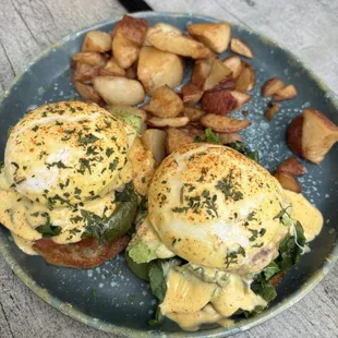 Eggs Benedict, spinach tomato and avocado