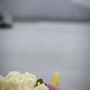 Bouquet resting on a canoe with Diamond Head backdrop!