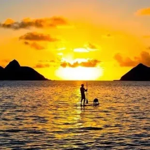 SUP IN PARADISE,OUT SIDE OF THE MOKES NEAR KAILUA,OAHU