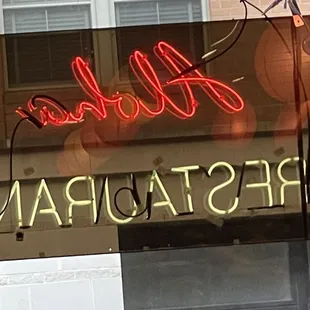 a neon sign for a restaurant