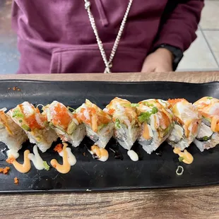a plate of sushi on a table