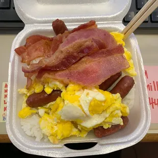 bacon and eggs in a styrofoam container