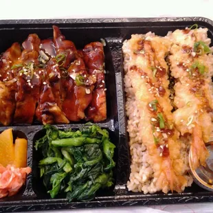 Sweet Teri chicken and Crispy Shrimp Tempura on brown furikake rice with daikon and greens...its a seven buck lunch ;-)