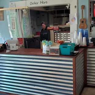  a man behind the counter