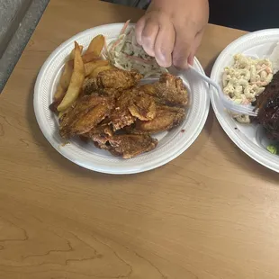 Chicken wing plate with fries and slaw