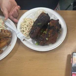 Ribs with rice and macaroni salad