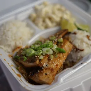 a meal in a styrofoam container