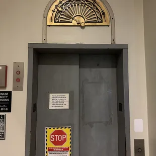 Image of the elevator with notice that the observation deck is closed
