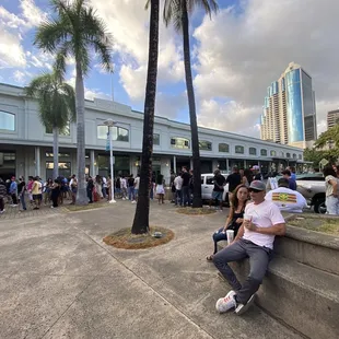 The line is moving but you better register for COVID tracing on your phone or you'll delay the line when you get to the gate