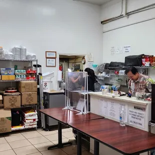 a woman working at a counter
