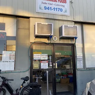 a bicycle parked in front of a store