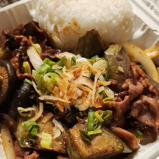 a meal in a styrofoam container