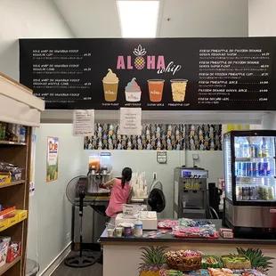 a woman behind a counter