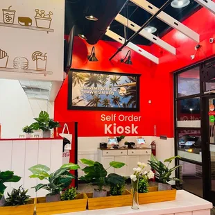 There are either self order kiosks or a staff member who can ring up the order for you.