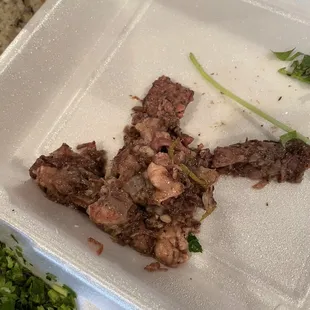 a meal in a styrofoam container