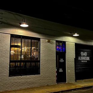 the outside of a building at night