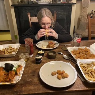 Wings, crab cakes, tots and the burger is long gone.