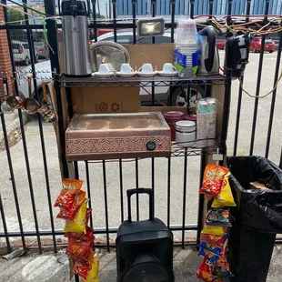 a table with food and a bag of chips