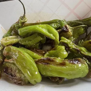 Farm fresh fire roasted SHISHITO PEPPERS!  Not spicy peppers-just delicious!