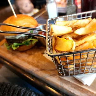 a basket of fries and a burger