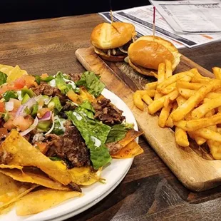 We had nachos and sliders for Happy Hour! Delicious! Would recommend! Riley was our server! She was great!