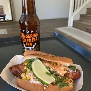 a hot dog and a beer