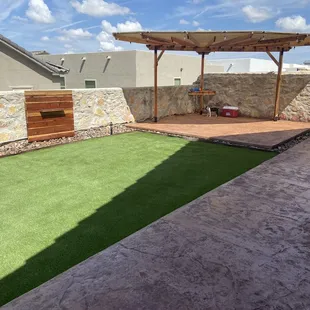 a patio with artificial grass